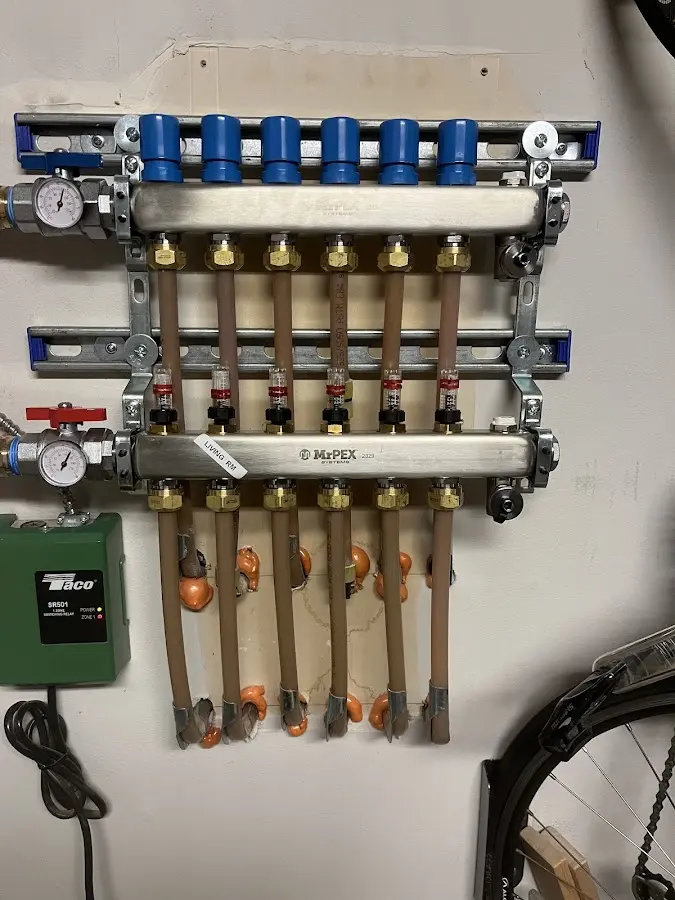 Plumber performing Water Heater Repair at a residential property in Oak Park Heights